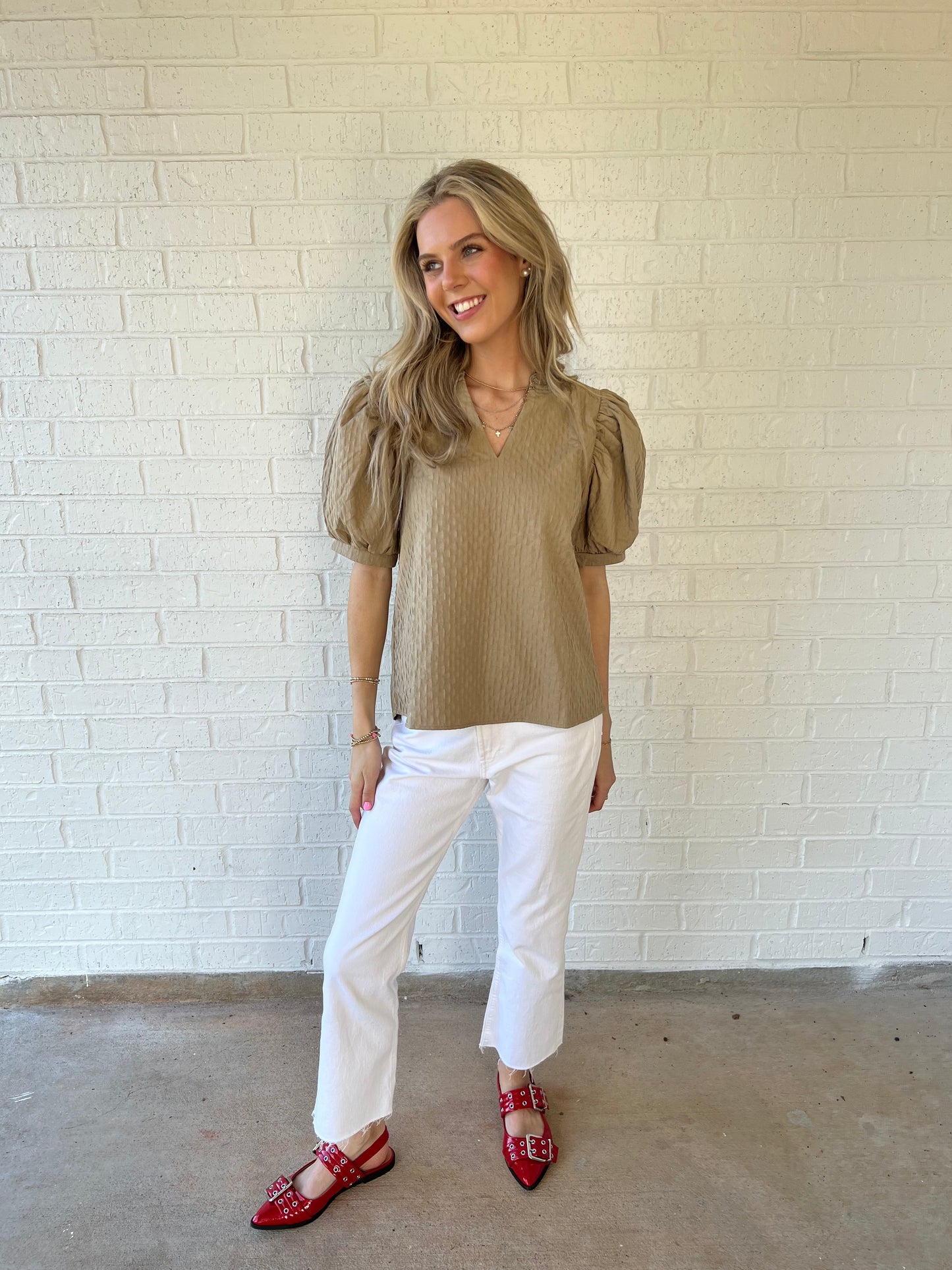 The tan puff sleeve top